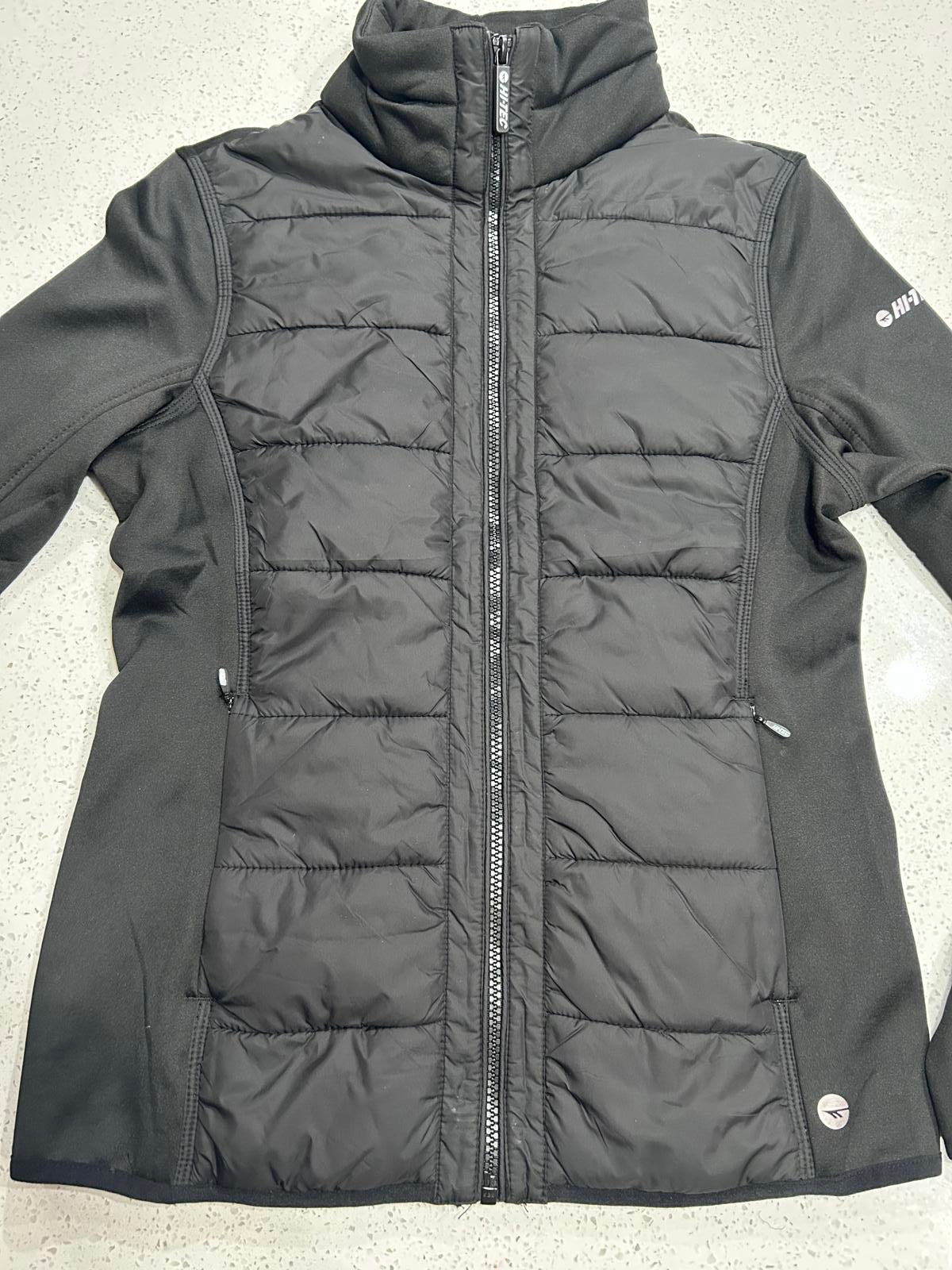 Hi-Tec branded black women's hybrid softshell and quilted puffer jacket