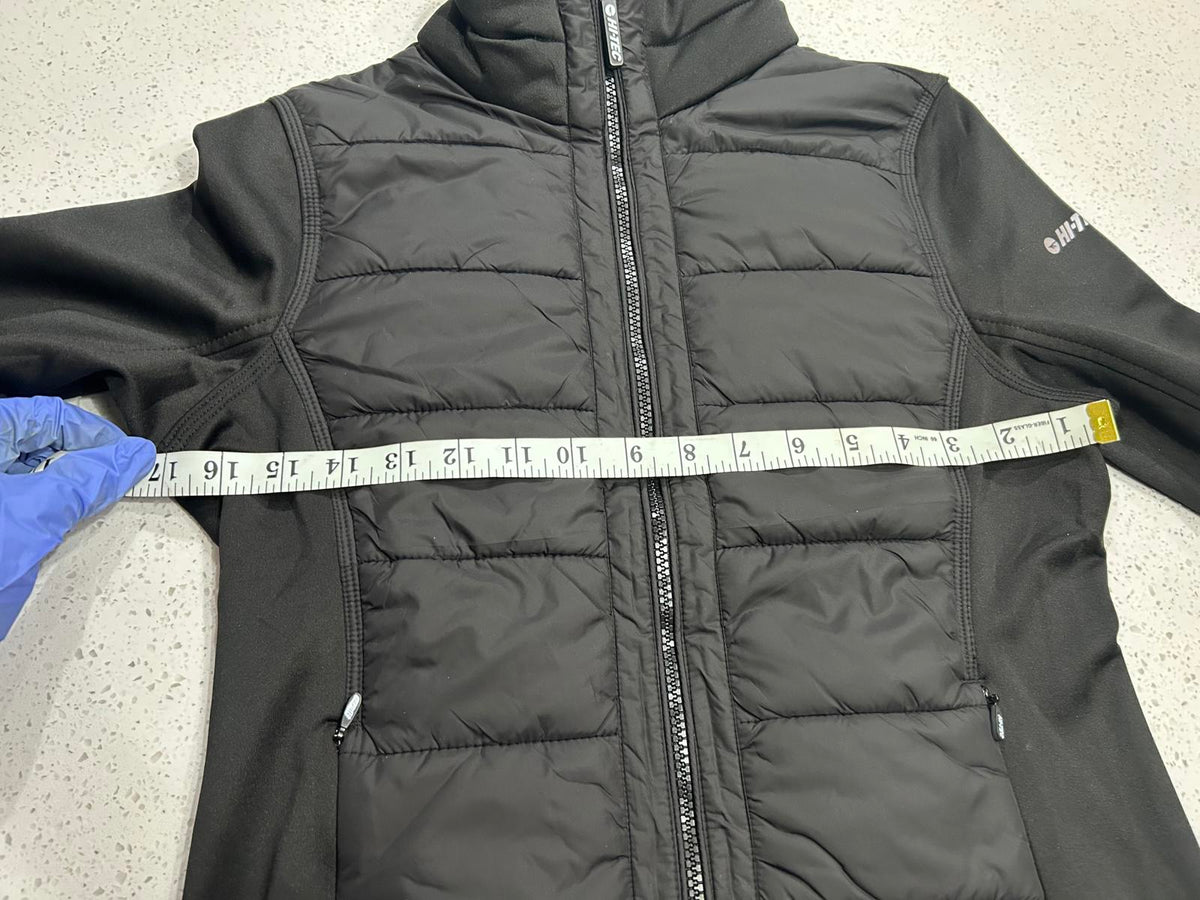 Hi-Tec branded black women's hybrid softshell and quilted puffer jacket